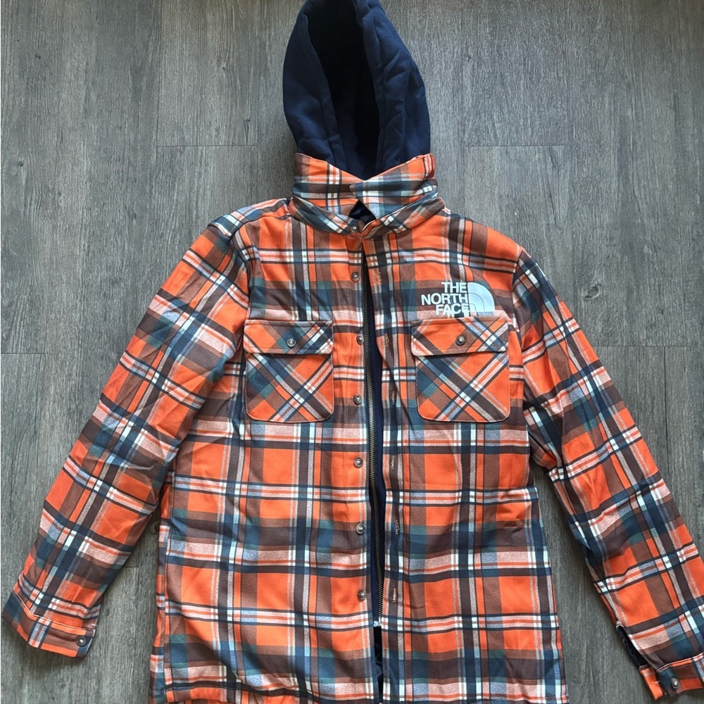 The North Face Kids Blue and Orange Plaid Puffer Jacket